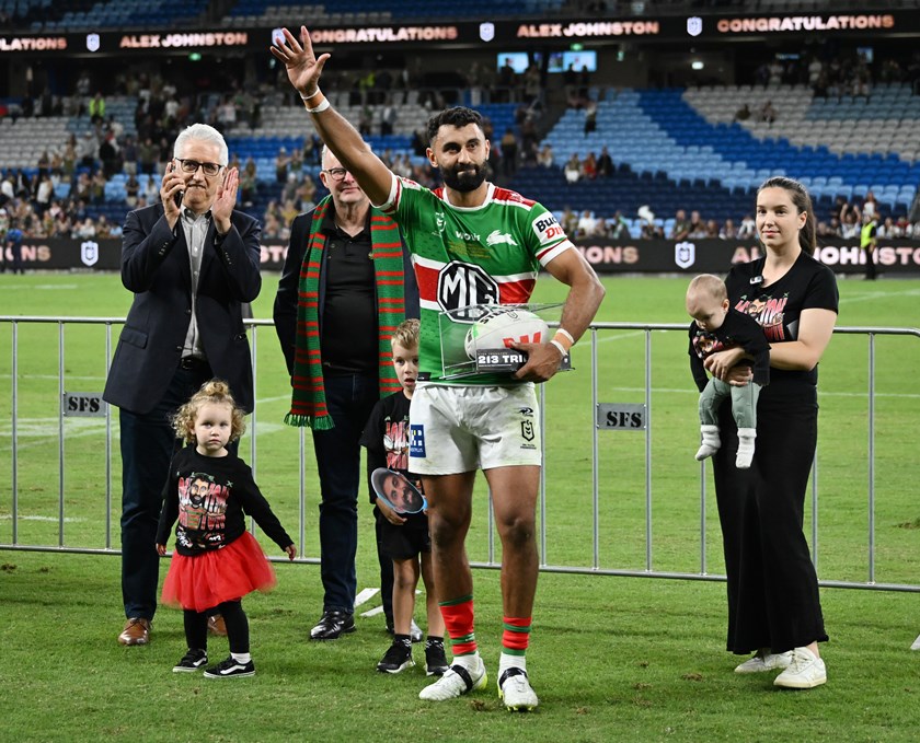 Alex Johnston with wife Taryn and their three children after he broke Ken Irvine's premiership tryscoring record in March.