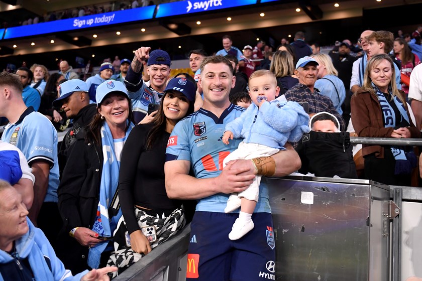 Max King celebrates his Origin debut with wife Christy and their son Hercules after NSW's 18-6 win at Suncorp Stadium.