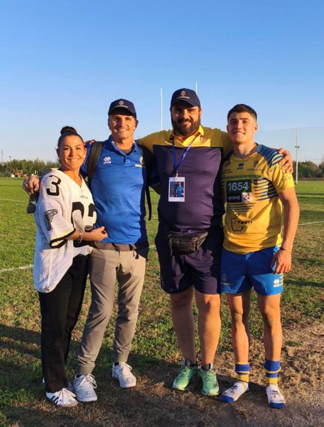 Jett Cleary with his parents Rebecca and Ivan, and Ukraine Rugby League president Artur Martyrosian in Italy.