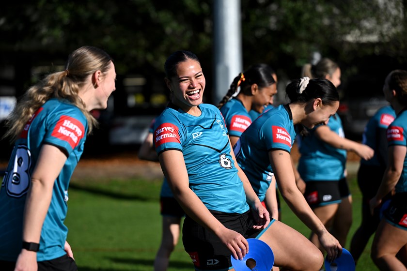 Victorian playmaker Rebecca Nelio shares a joke with team-mates while preparing to play at the Harvey Norman Rising Star Invitational.