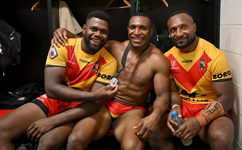 Epel Kapinias, Edwin Ipape and Valentine Richard celebrate victory with the Kumuls. Kapinias and Ipape are expected back for the 2025 Pacific Championships.