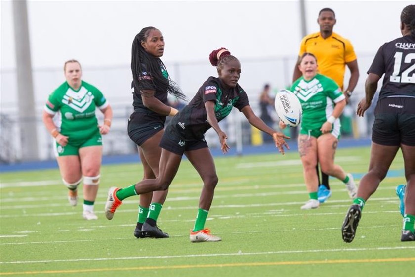 Nigerian hooker Becky Okitikpe passes out of dummy half.