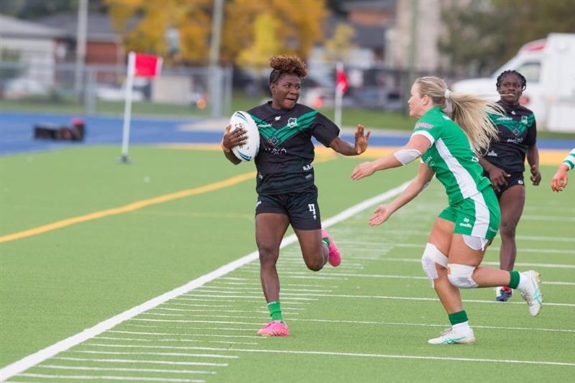 Ireland fullback Lily Rogan attempts to stop a break by Nigerian centre Abiola Obazuaye.