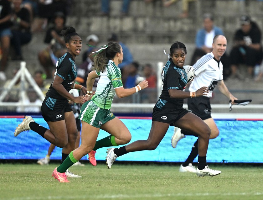Taina Naividi makes a break for Fiji in the 2024 World Cup qualifier against Cook Islands.