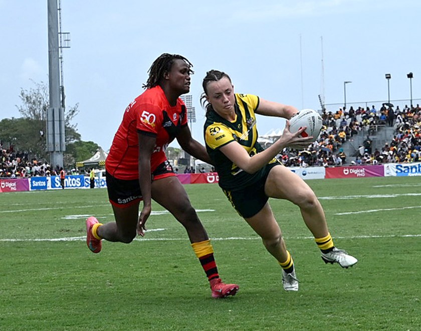 Caitlin Turnbull crosses for one of her three tries for the Australian PM's XIII against PNG.