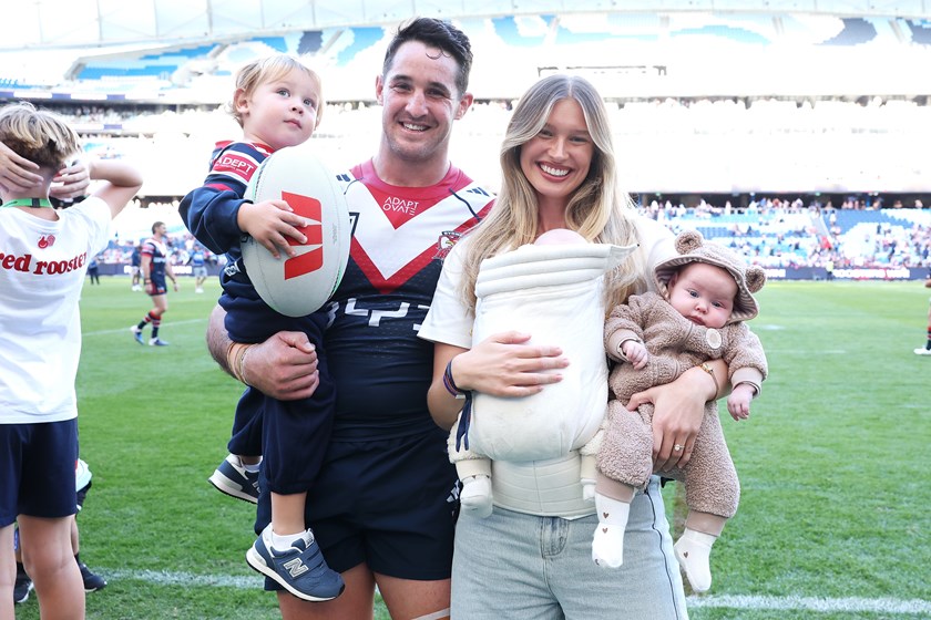 Nat Butcher and wife Harmony with son Beau and twins Belle and Billie after a win over the Knights in Round 7.