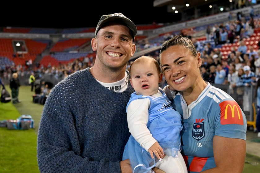 Adam and Millie Elliott with baby Gigi after the Blues' triumph in Game One of the women's Origin series.