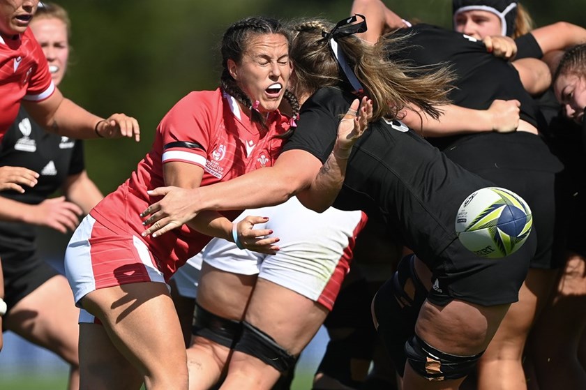 Wales dual international Ffion Lewis in action against Stacey Waaka's Black Ferns.