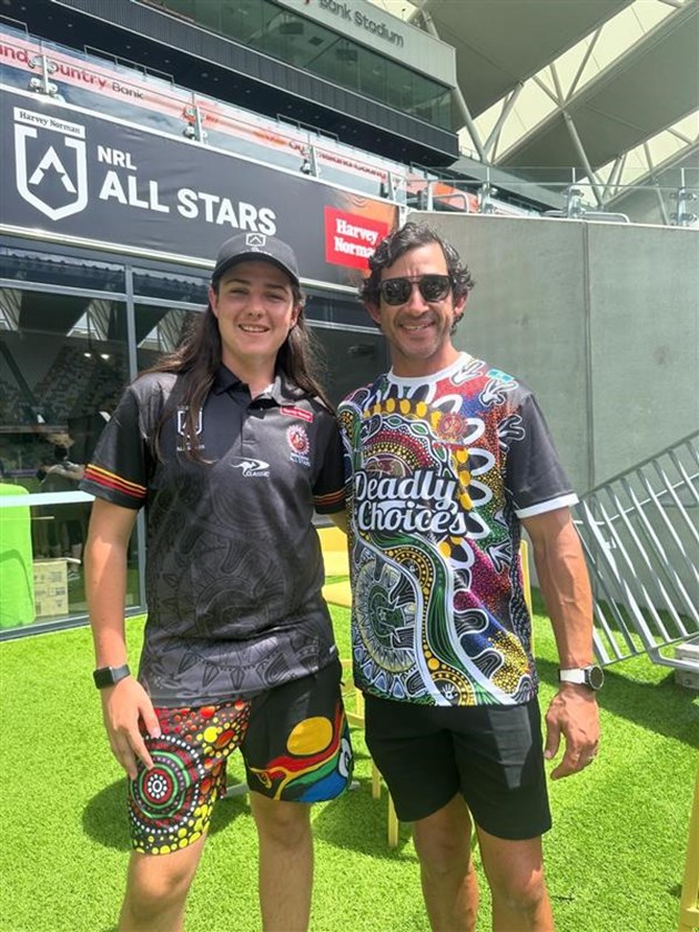 Axel Wellings pictured with Johnathan Thurston at the 2024 Harvey Norman All Stars during the week camp