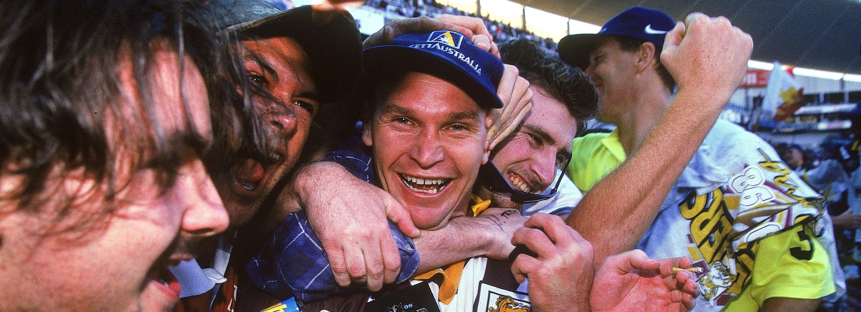 Langer celebrates with Broncos’ fans after the club’s 1998 Grand Final win.