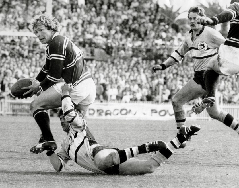 Fulton was a clear Man of the Match in the 1973 Grand Final. Here he tries to break through a tackle by Cronulla’s Warren Fisher during the semi final.