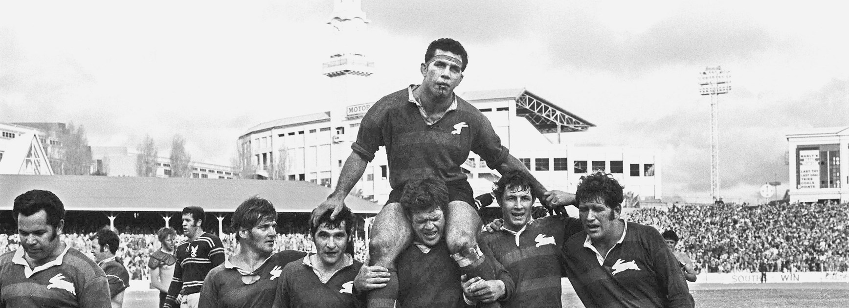 John Sattler is chaired from the SCG by team-mates after leading South Sydney to victory in the 1970 grand final while playing with a shattered jaw for 77 minutes