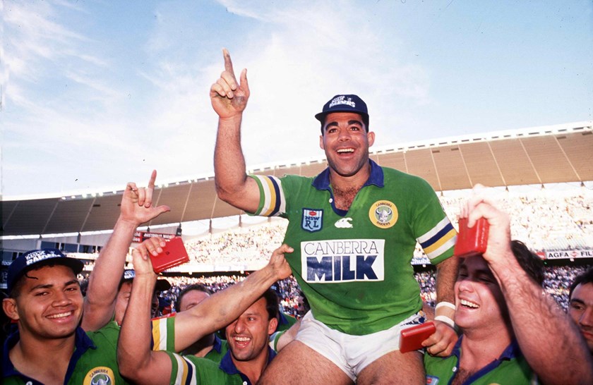 Meninga chaired from the field by Laurie Daley and Brad Clyde after the Raiders claimed the 1994 premiership.