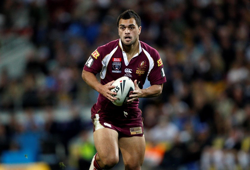 Karmichael Hunt on the move for the Maroons in 2009.